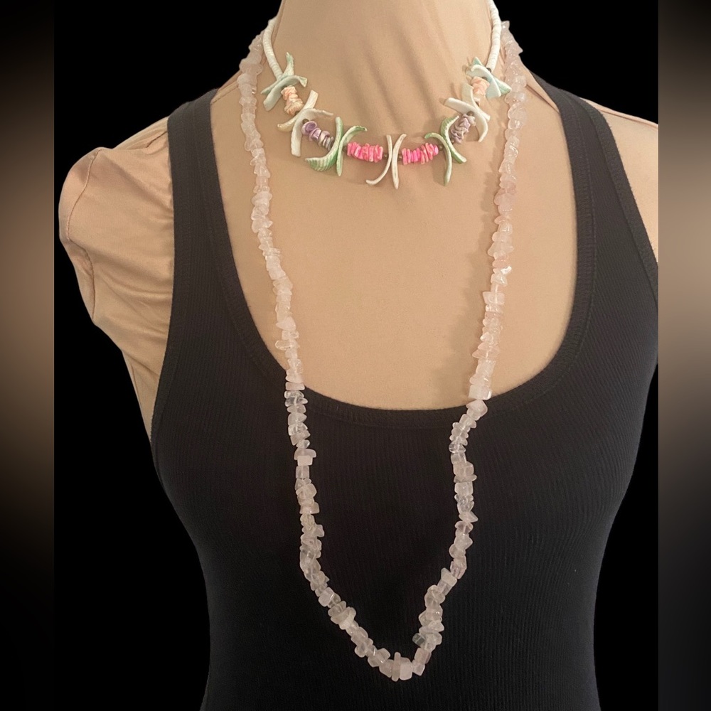 Multi Colored puka shell with Rose Quartz chip long strand necklace.